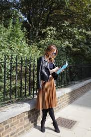 The black pleated skirt can look great both as part of a work outfit and a street outfit. 30 Ways To Style A Pleated Skirt Closetful Of Clothes