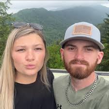 Grey "cardigan with fringe onsleeves