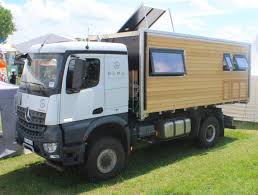 All Terrain Natural Wood Cabin Expedition Vehicle Explores The Spaces From Whence It Came Expedition Vehicle Adventure Campers Off Road Camping