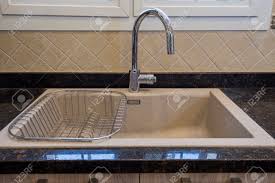 Ledge sink accessories by create good sinks. Interior Design Decor Showing Modern Kitchen Sink In Luxury Apartment Showroom Stock Photo Picture And Royalty Free Image Image 124972239