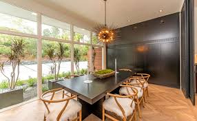 A compact folding design is complete with chairs that store away underneath the ta. 20 Timeless Midcentury Modern Dining Rooms Home Design Lover