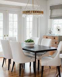 Here are some inspirations to find the perfect chandelier for dining rooms. Acrylic Chandelier Elevates Transitional Dining Room Transitional Dining Room Dining Room Makeover Modern Lighting Chandeliers