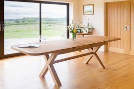 When choose your dining table, a double pedestal table definitely something you need to think about. Large Double Extending Cross Leg Oak Table Oval 10 12 Seat