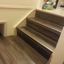 Fitting the stair nose to overlap the riser, gently press the laminate onto the subfloor. China Pvc Vinyl Flooring For Stairs China Vinyl Flooring Spc Flooring