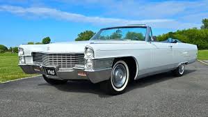 Image result for Starlight Silver 1965 Cadillac