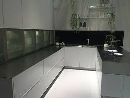 What a modern kitchen with dark gray cabinetry and a touch of a yellow with the bar chairs! Modern Gray Kitchen Cabinets Beat Monotony With Style