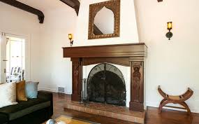 Spanish mission style architecture was inspired by the churches built by colonial spanish missionaries. Defining Elements Of Spanish Style Design Wrought Iron Light Fixtures Illuminaries Lighting