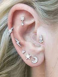 Piercing 101 Everything You Need To Know About Tragus Piercings Tragus Piercings Silver Ear Cuff Ear Cuff