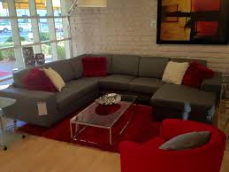 These rugs are all perfect for a gray sofa and add a flare of personality. Pin By Rebecca Lu On Downstairs Family Room Living Room Red Living Room Grey Grey And Red Living Room