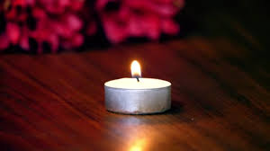 Choose from 311 free fire stock videos to download. Romantic Mood Background Video Of A Tea Candle With Flickering Flame On A Dark Wood Grain Table And Red Flowers In The Background Video By C Jkirsch13 Stock Footage 186757356