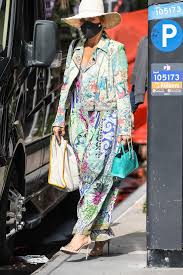 The multihyphenate will receive the award at the e! Jennifer Lopez In Floral Motorcycle Jacket Floral Maxi Dress Out In Ny Fashionsizzle