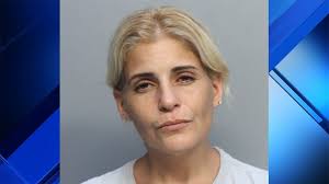 Police: West Miami woman shoved son's head into couch, 'appearing to  suffocate him'