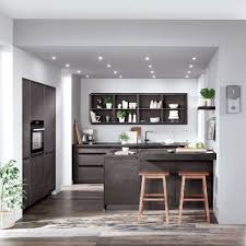 The white and gray marble waterfall countertop is the star of the show in this shaker kitchen design. Speed Kitchen Black Concrete Hintex Home Interior Exterior Building Materials