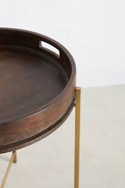 If you're looking for more rustic vibes, try the anthropologie wood coffee table. Ancona Tray Table Anthropologie