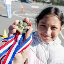 🏃‍♂️ A @westpotomachs tradition that is 25 years strong! The “Running is  Elementary” program is an annual event that sends the West Potomac High  School's track and field team out to coach
