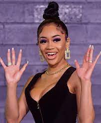Diamonté Quiava Valentin Harper known as #Saweetie is a #BlasianAmerican  rapper, singer & songwriter (& for me the most beautiful rapper out rn).  She signed to Warner Records after she released "Icy