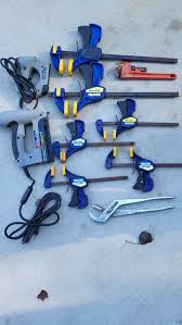 2 Electric Staple Guns, 6 Wood Clamps and 2 Pipe Wrenches Pickup in Tellico  Village at residence, cash only or meet/pickup at Food Lion Tellico Village.