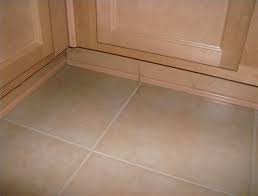 If you plan to remove a whole wall of tiles, try tapping the edge of each one with a chisel for signs of looseness. How To Replace Kitchen Cabinet Base Molding Ehow Cabinet Molding Base Moulding Replacing Kitchen Cabinets