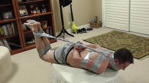Hogtied in duct tape - ThisVid.com