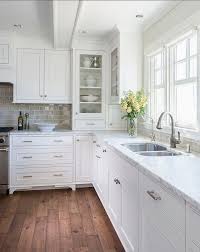 Benjamin Moore Winds Breath Oc 24 They Are Beautifully Accented With Brushed Nickel Cabinet Pul White Kitchen Design Kitchen Cabinet Design White Kitchen Paint