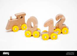 Alphabet refers to the letters of a language, arranged in the order fixed by custom. Holz Nummern 0 1 2 3 4 5 Buchstaben Autos Zug Alphabet Mit Gelben Rader Auf Weissem Hintergrund Fruhkindliche Bildung Lernen Zu Zahlen Presch Stockfotografie Alamy