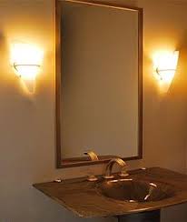 Mirrors With Side Wall Lighting In Livingroom Wall Sconces On Either Side Of The Mirror Bathroom Lighting Bathroom Lighting Bathroom Mirror Mirror