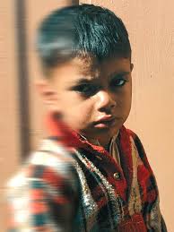 In the midst of the bustling crowd and the pouring rain, he found his  solitude, a silent observer of the world's chaos, yet untouched by its  storm. #raindrops