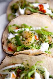 Paired with creamy sriracha mayonnaise and crunchy quick pickled vegetables, this sandwich hits all the right flavor notes and textures. Healthy Shrimp Tacos With Cilantro Pesto Cabbage From Scratch Fast