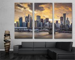 Image is wrapped around sides of canvas. New York City Skyline Brooklyn Bridge Canvas Print 3 Panel Split Tr Canvas Quest