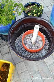 The diy plant stands look great and bring harmony to the space because the legs match the white trims well while the tops complement the wooden floor the metal construction makes it a sturdy plant stand that you can use either outdoor or indoor. Diy Planter Umbrella Stand Tutorial H2obungalow