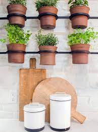 10 Clever Container Gardens We Love From Joanna Gaines Indoor Herb Garden Herb Pots Herb Wall