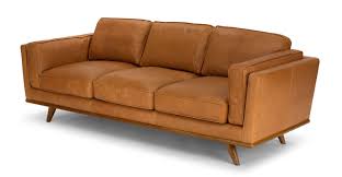 Also, return shipping is only $49, and if you do an exchange it is completely free. Timber Charme Tan Sofa Sofas Article Modern Mid Century And Scandinavian Furniture Living Room Furniture Sofas Tan Leather Sofas Tan Sofa