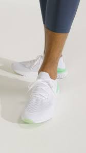 An updated flyknit upper conforms to your foot with a minimal, supportive design. Run Your Most Colorful Comfy Miles Ever In Lush Lime A New Epic React 2 Color On Nike Com Bounce Over To Nik Video Running Shoes For Men White Shoes Men Nike Shoes
