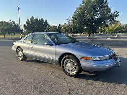 Image result for Portofino Blue 1995 Town Car
