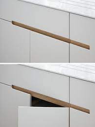 No Hardware For The Kitchen Cabinets In This London Home This Kitchen Has White Melami Melamine Cabinets Kitchen Cabinets Without Hardware Kitchen Furniture