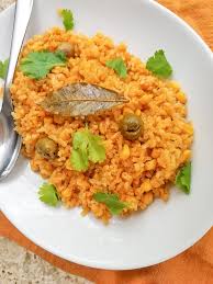 Next, add your rice and your beans together and mix the tomato and sofrito sauce well through. Puerto Rican Rice Puerto Rican Yellow Rice With Corn Mexican Appetizers And More