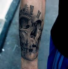 Arms while the arms are usually the place for bigger sleeve tattoos your roman numeral tattoo could find a home there as well. 50 Realistic Skull Tattoos For Men Masculine Design Ideas