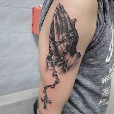 The praying hands tattoos are used as a symbol of religious devotion. Praying Hands Tattoo With Meaning Jesus Hand Tattoo With Rosary