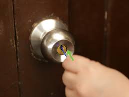You can do this with a paper clip whose end is bent into a small loop. 3 Ways To Pick Locks On Doorknobs Wikihow
