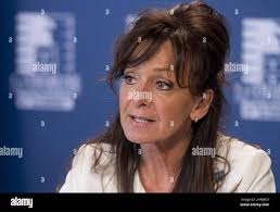 Nancy Bedard, vice-president of the Quebec's Nurses Union (FIQ), speaks to  reporters at a news conference