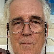 Newly elected President of Bolivia Luis Arce waves to supporters with his  wife Lourdes Brigida Durán Romero (L) and President of the Bolivian Chamber  of Senators Andrónico Rodríguez (R) from a balcony