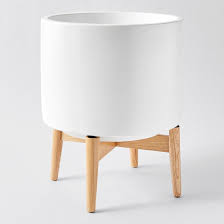 Jonas Planter On Wooden Stand White Target Australia 27 or 29 inches—the iron planter pots rest on top of a very 4/10.