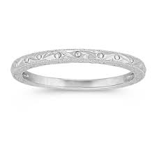 Stones rest on the top of these pretty white, yellow, and rose gold diamond wedding rings for women. 14k White Gold Engraved Wedding Band Shane Co