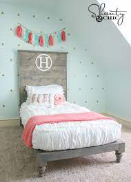 The trundle which is the same size as the twin pulls out for convenience and disappears just as quickly. Diy Twin Platform Bed And Headboard Shanty 2 Chic