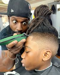 He wasn't ready to go Back To School 😫 Then he 😳 me after getting his  haircut. He said he wants to GO BACK 📚 🏫 #backtoschool . . #ilovethekids  #kidshaircut #phingerprint #phillybarber #ultimatelifestylebb