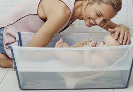 Tagged as flexible baby bathtub, foldable baby tub, nice baby shower tub, portable baby tub, traveling baby tub design. Stokke Flexi Bath New Flexi Bath Toys