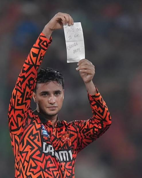 After reaching his century, Abhishek celebrated uniquely by pulling out a  paper from his pocket that read, "This one is for the Orange Army,"  dedicating his feat to SRH's loyal fans. The