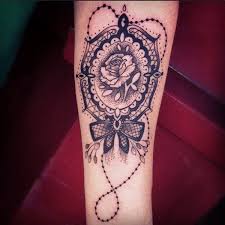 Lace texture can also be employed to create other striking designs of flowers, birds and animals. Red Rose Lace Tattoo