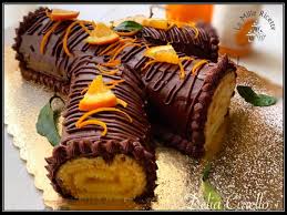 Ingredienti e preparazione di questo delizioso dolce a base di cioccolato e arancia, che piacerà tanto a grandi e ai piccini. Rotolo Arancia E Cioccolato Golosissimo Effetto Fiesta