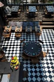 Black And White Restaurant Floor Tiles Restaurant Black And White Checkered Floor Restaurant Interior Design Stylish Restaurants Restaurant Interior